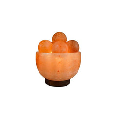Fire bowl Himalayan salt lamp filled with round glowing massage-ball salt stones