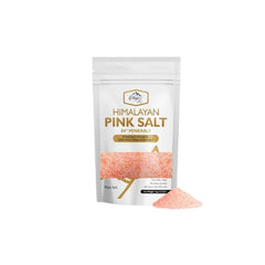 Bag of Himalayan pink fine salt with a small pile of salt shown in front