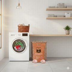10kg bag of Himalayan water softener salt tablets standing beside a washing machine and laundry basket