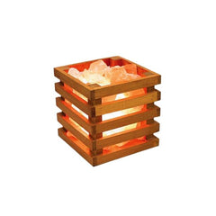 Square wood-slat basket lamp filled with glowing Himalayan salt chunks against a white background