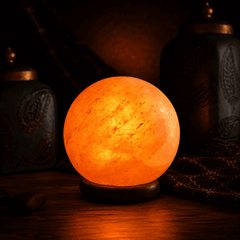 Large Himalayan Salt Ball Lamp (4kg) – studio photo lit against a dark background