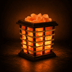 Cane Wood Basket Himalayan Salt Lamp – studio photo lit against a dark background