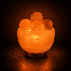 Fire Bowl Himalayan Salt Lamp with Massage Balls – studio photo lit against a dark background
