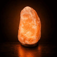 Himalayan Salt Lamp (12-15 kg) – studio photo lit against a dark background