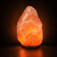 Himalayan Salt Lamp (15-20 kg) – studio photo lit against a dark background