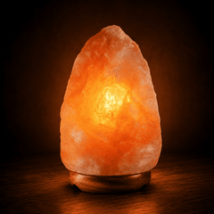 Himalayan Salt Lamp (5-7kg) – studio photo lit against a dark background