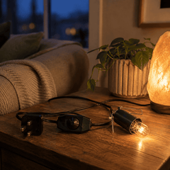 Salt lamp Black Cable with Dimmer – styled in a home lifestyle setting, lit at evening