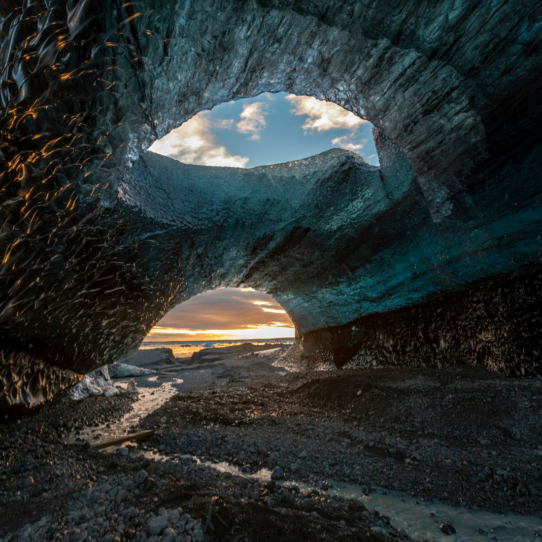 Sunlit stone cave interior, evoking the ancient mines behind Himalayan salt traditions
