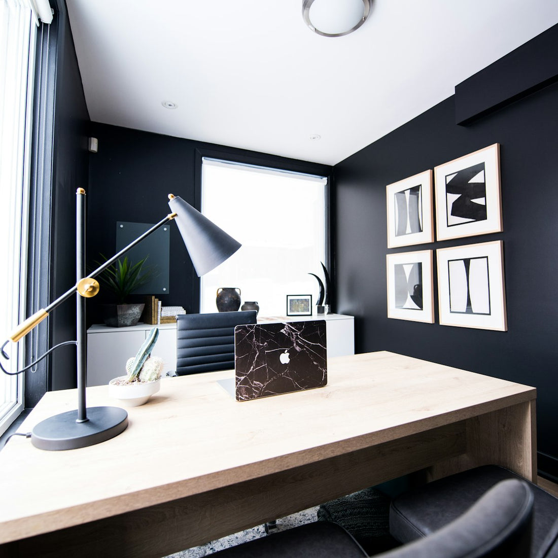 Small USB-powered salt lamp glowing beside a laptop on an office desk