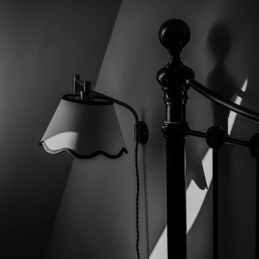 Warm lamp light casting soft shadows in a cozy bedroom, the ambiance of a natural salt lamp