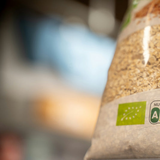 Close-up of a food package label with quality and origin information, like reading salt product labels