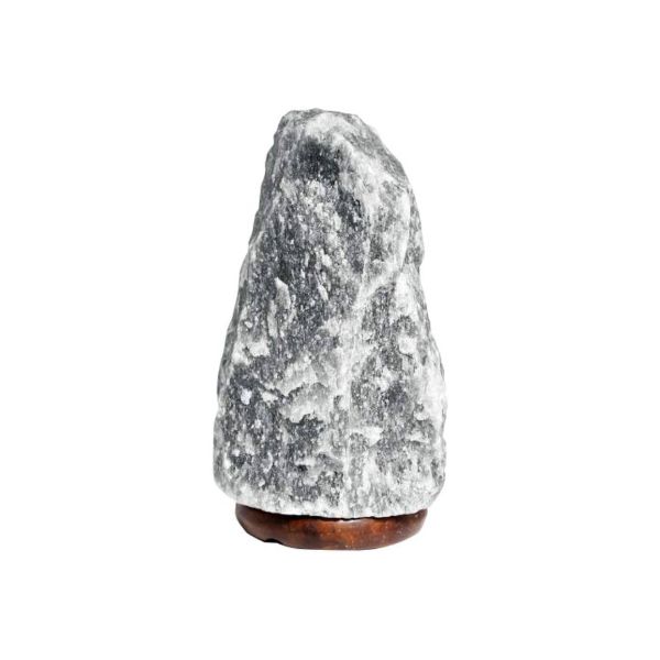 Grey Himalayan salt lamp on a wooden base against a white background