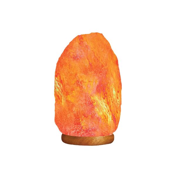 Natural Himalayan salt lamp glowing amber on a wooden base against a white background