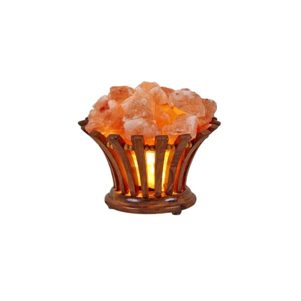 Flower-shaped wood-slat basket lamp filled with glowing Himalayan salt chunks against a white background