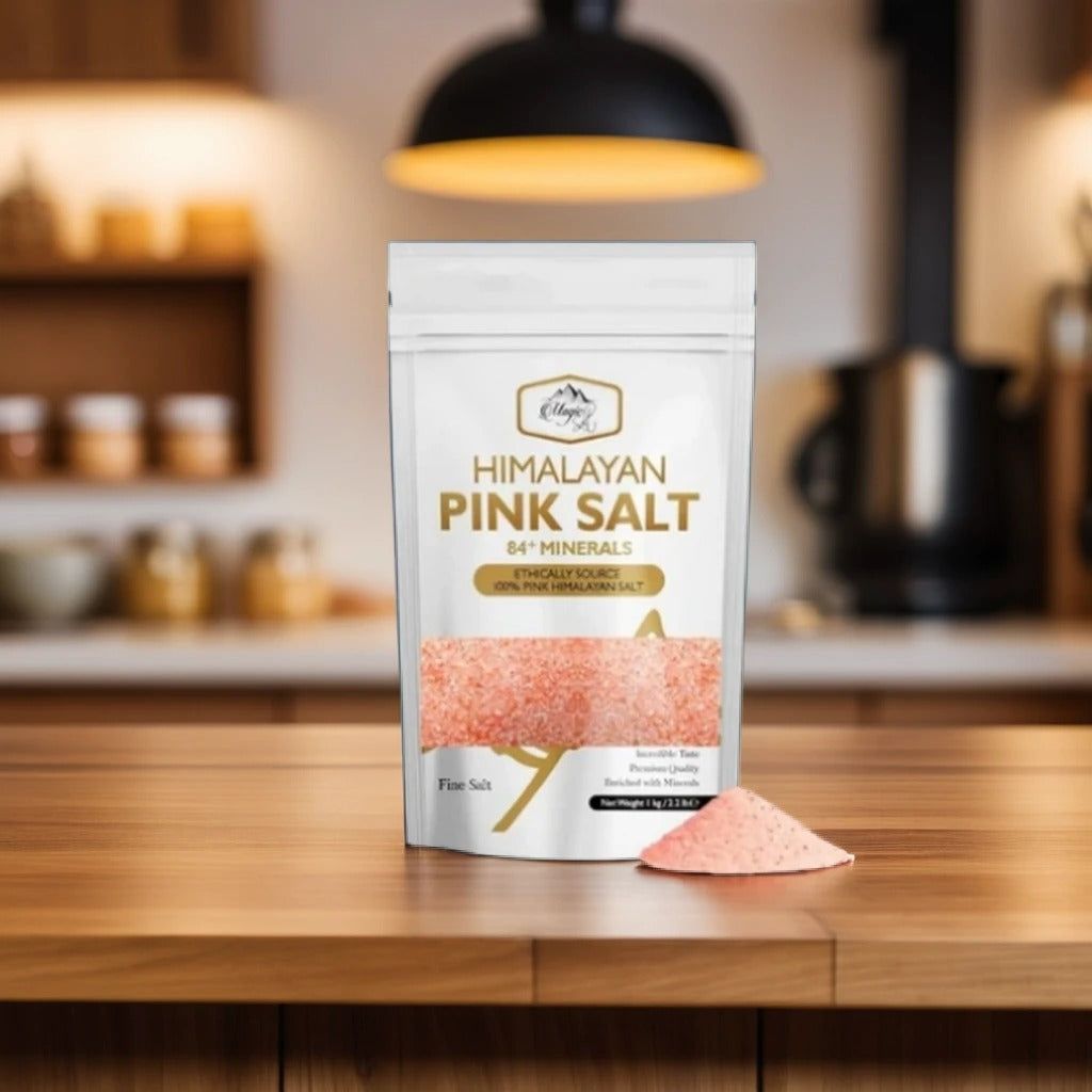 Bag of Himalayan pink fine salt standing on a kitchen counter under a pendant light