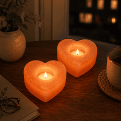 Heart Himalayan Salt Candle Holder (Set of 2) – styled in a home lifestyle setting, lit at evening