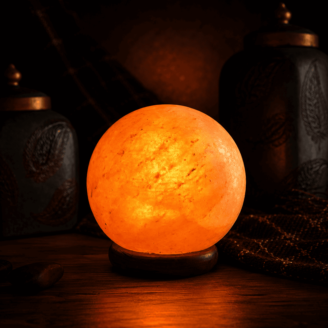 Large Himalayan Salt Ball Lamp (4kg) – studio photo lit against a dark background