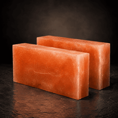Natural Himalayan Salt Brick (Pack of 2) – studio photo lit against a dark background