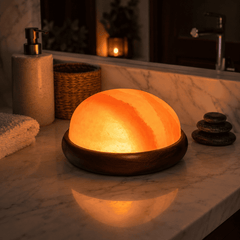 Himalayan Salt Crystal Foot Massage Stone – styled in a home lifestyle setting, lit at evening
