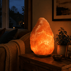 Himalayan Salt Lamp (15-20 kg) – styled in a home lifestyle setting, lit at evening