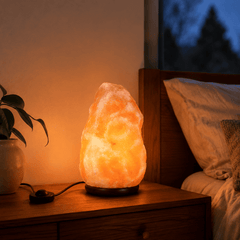 Himalayan Salt Lamp (2-3kg) – styled in a home lifestyle setting, lit at evening