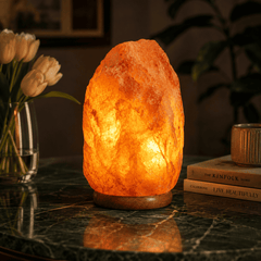 Himalayan Salt Lamp (9-12kg) – styled in a home lifestyle setting, lit at evening
