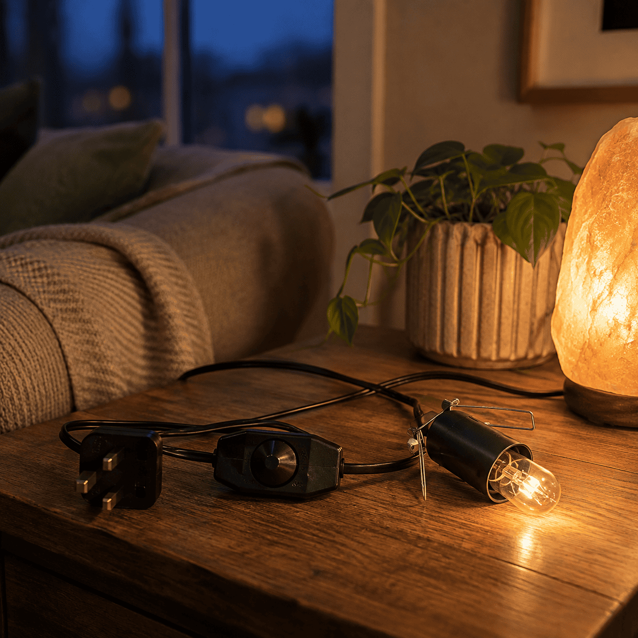 Salt lamp Black Cable with Dimmer – styled in a home lifestyle setting, lit at evening