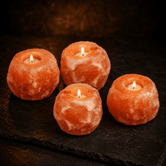 Natural Pink Himalayan Salt Candle Holder (Set of 4) – studio photo lit against a dark background