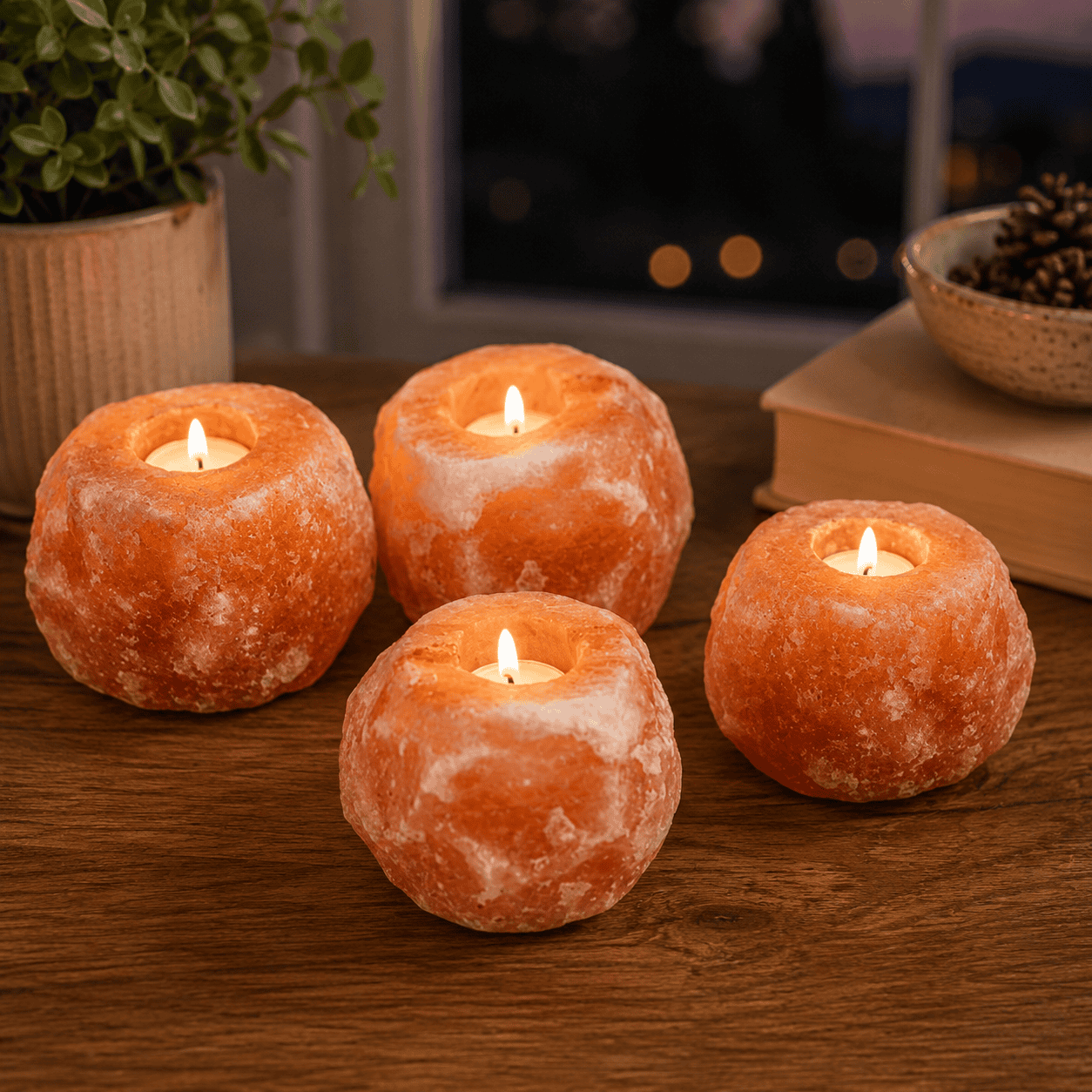Natural Pink Himalayan Salt Candle Holder (Set of 4) – styled in a home lifestyle setting, lit at evening